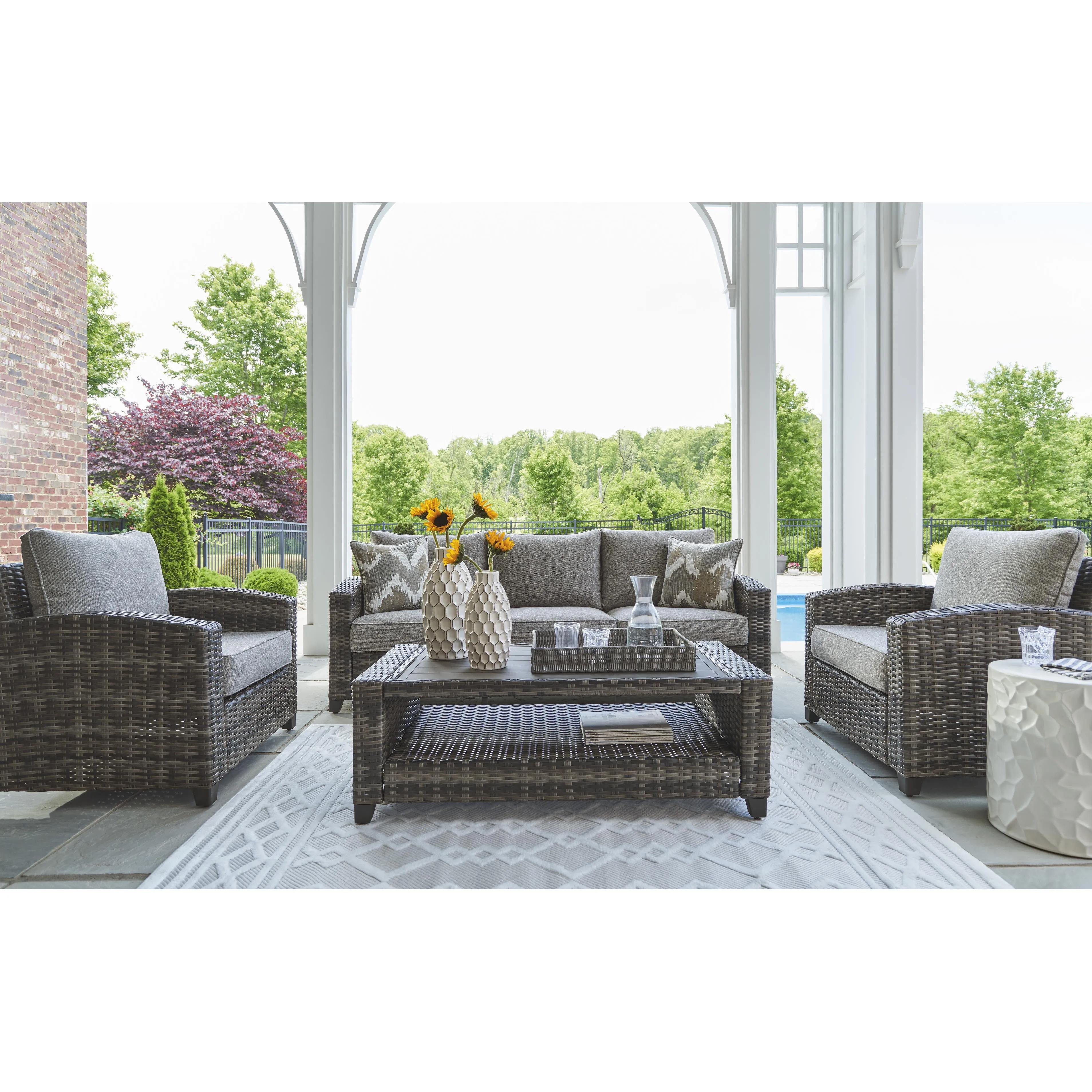 Signature Design by Ashley Oasis Court P335-081 Sofa/Chairs/Table Set